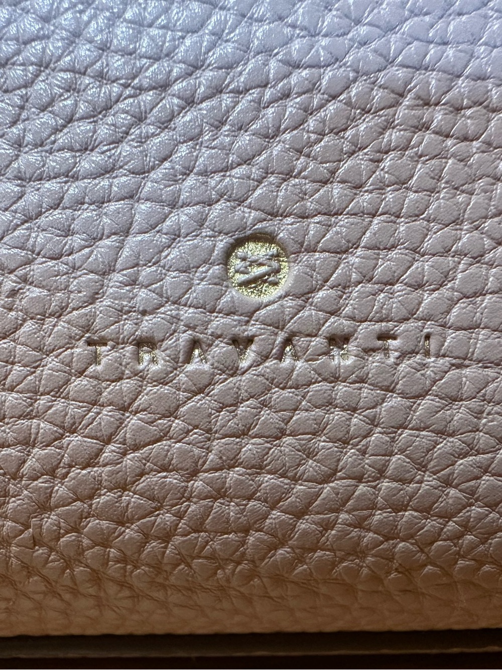 Travanti pink large tote with a cosmetic case inside